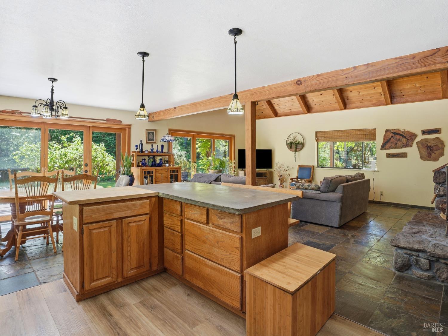 31397 Seaview Road Cazadero, CA 95421 - Photo 11 of 47 a kitchen with stainless steel appliances granite countertop a sink and a wooden floor
