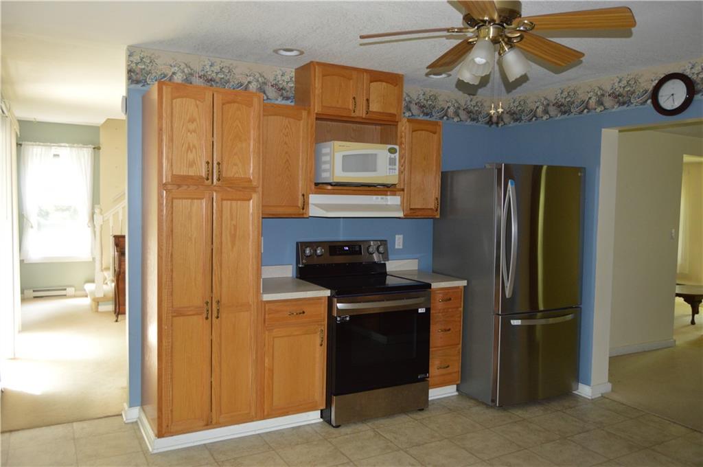3244 Maple Lane Jamestown, PA 16134 - Photo 8 of 27 a kitchen with stainless steel appliances granite countertop a refrigerator and a sink