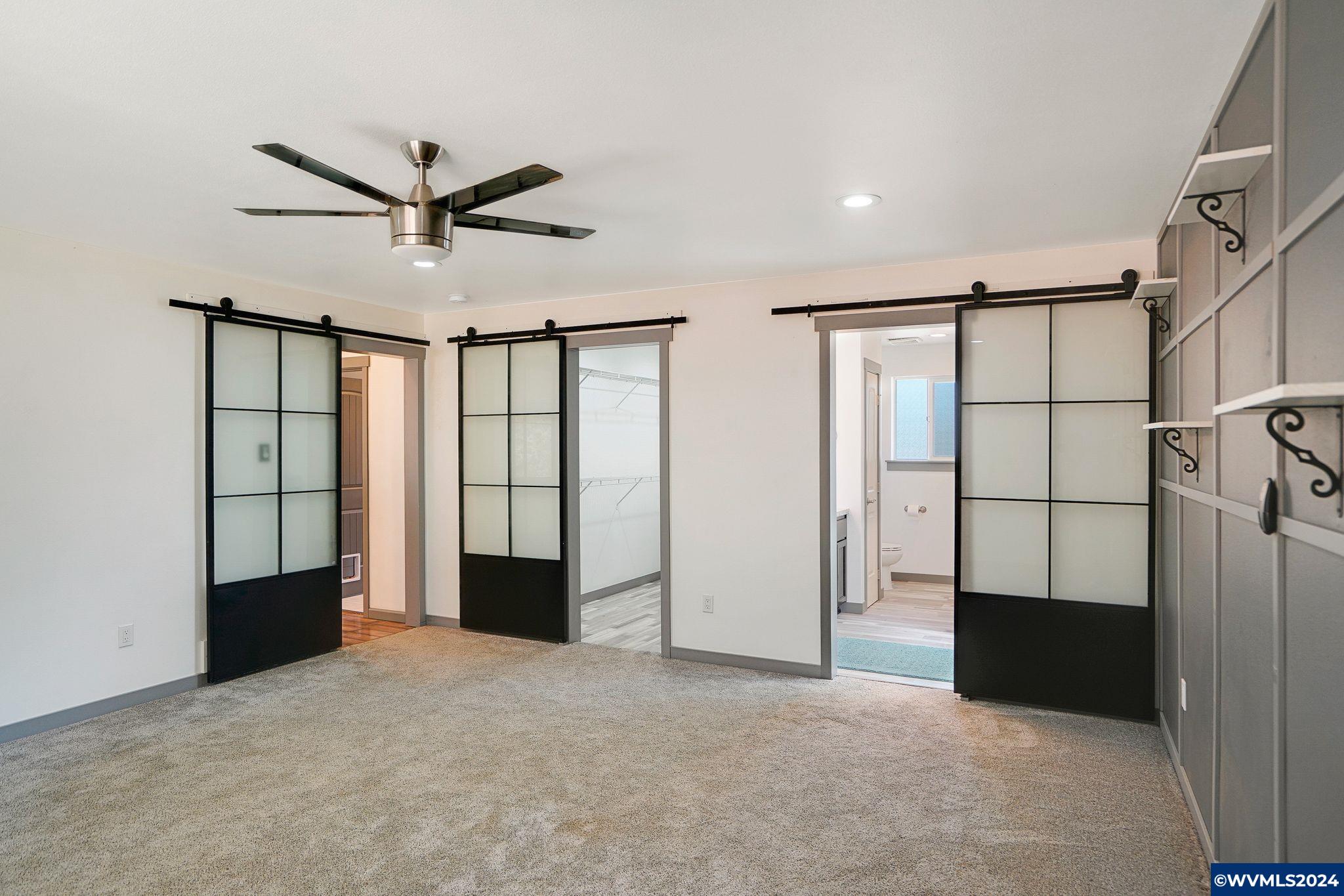 16480 Oakdale Road Dallas, OR 97338 - Photo 20 of 42 a view of a big room with closet and windows