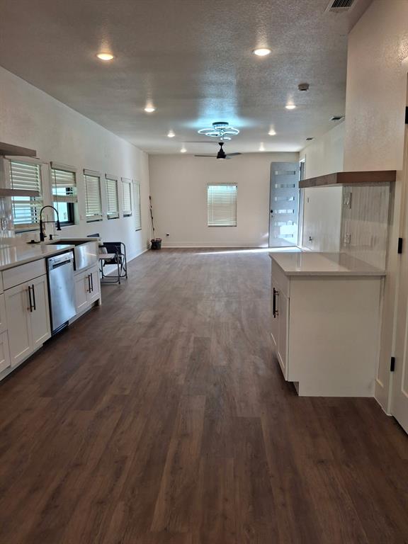 902 Chestnut Street Commerce, TX 75428 - Photo 18 of 18 a view of kitchen with sink microwave and refrigerator