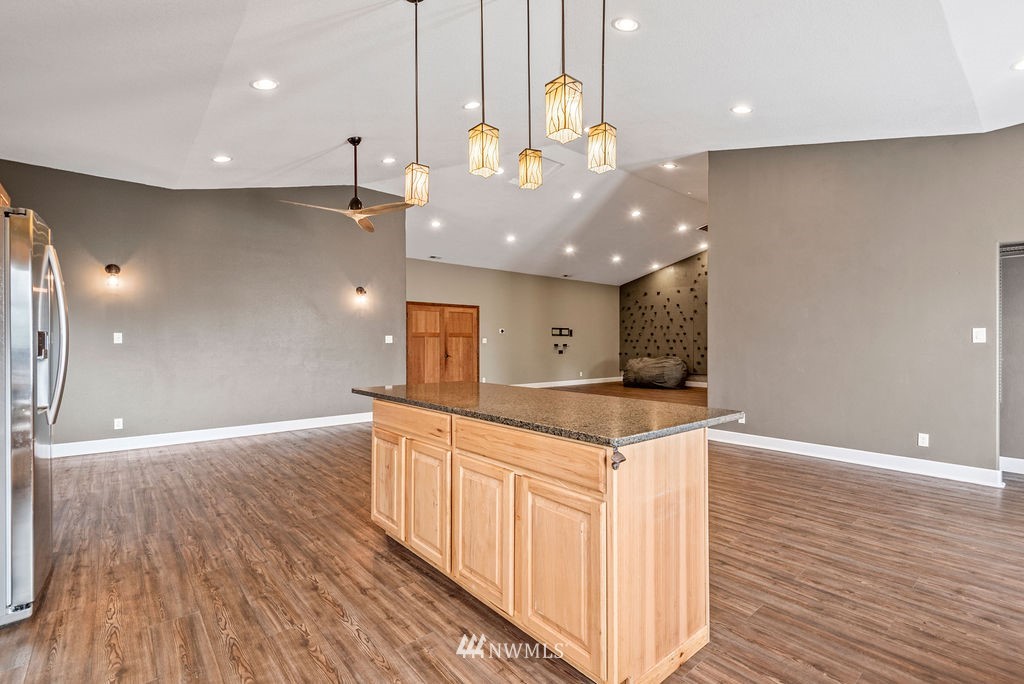 195 Puma Road Longview, WA 98632 - Photo 12 of 39 a kitchen with a sink a refrigerator and a stove