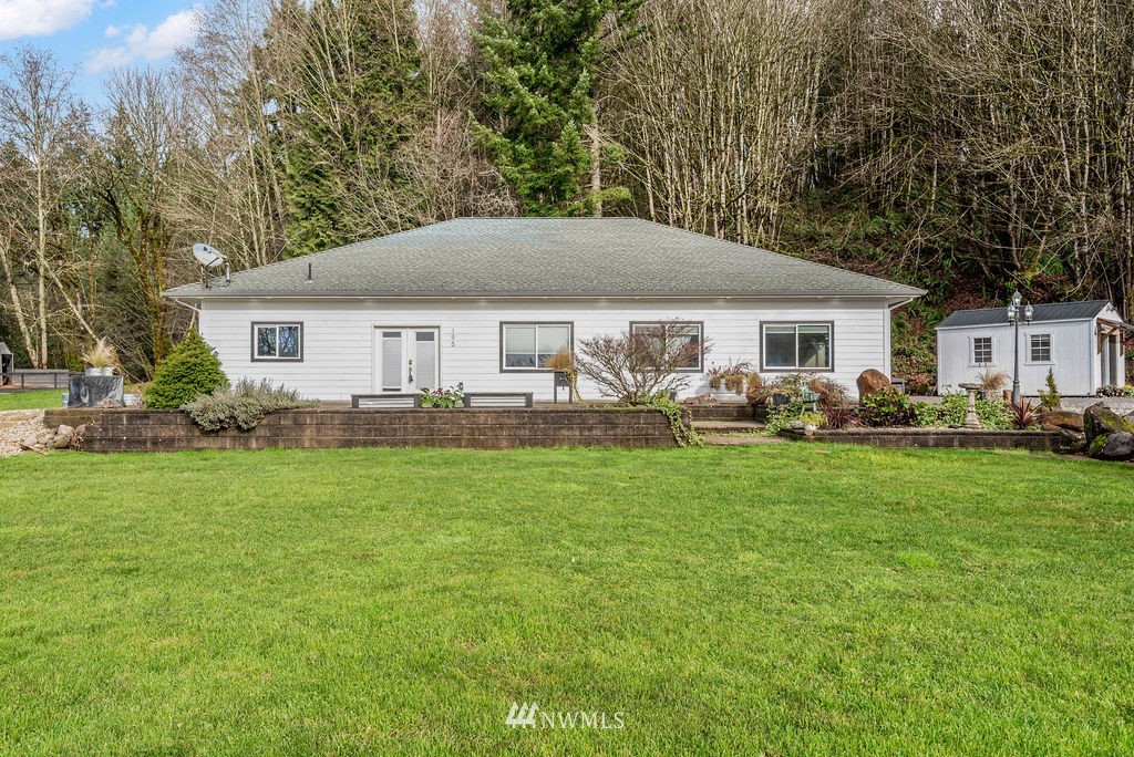 195 Puma Road Longview, WA 98632 - Photo 3 of 39 a front view of house with yard and outdoor seating