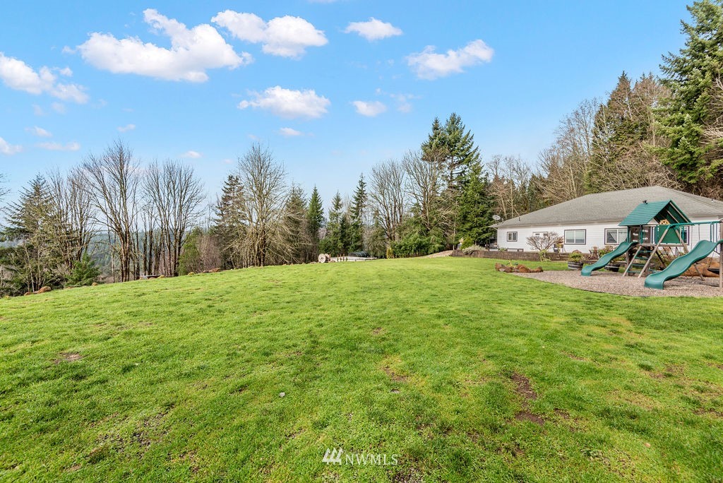 195 Puma Road Longview, WA 98632 - Photo 32 of 39 a view of a house with a big yard