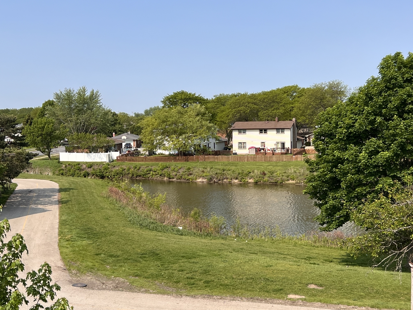 159 West Elk Trail, Unit 356 Carol Stream, IL 60188 - Photo 14 of 21 a view of a lake with a yard