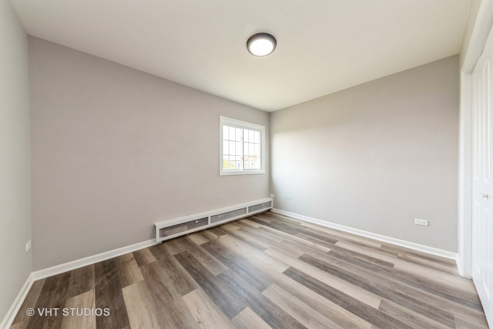 159 West Elk Trail, Unit 356 Carol Stream, IL 60188 - Photo 9 of 21 an empty room with windows
