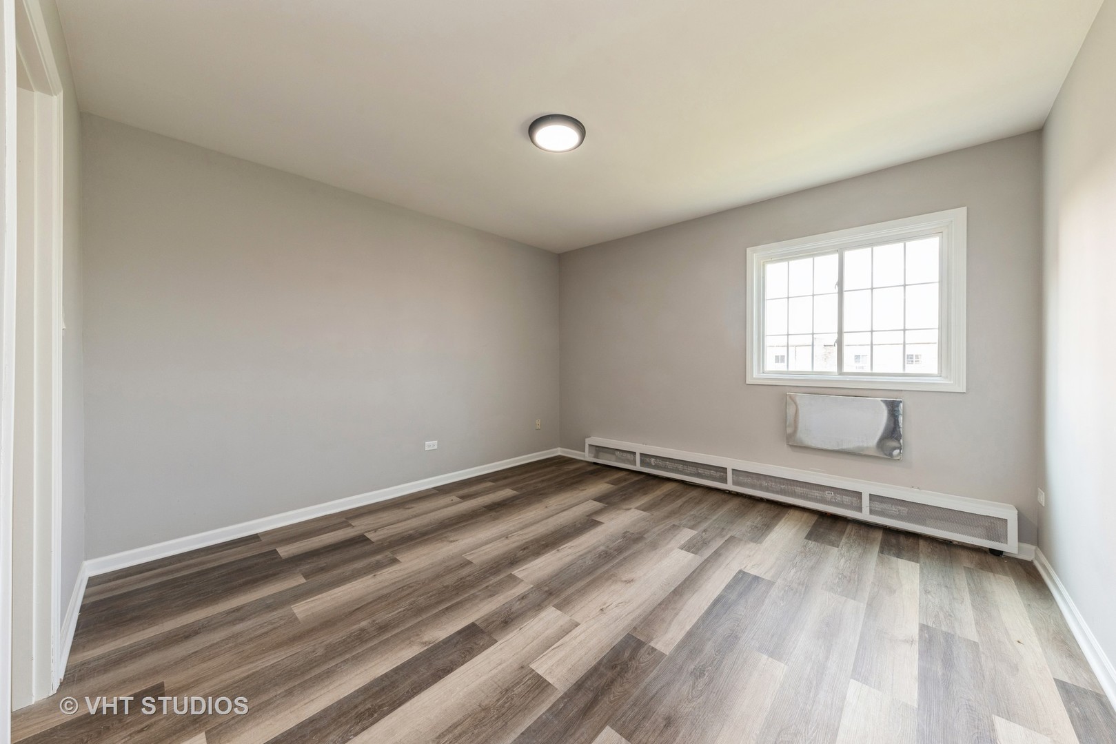 159 West Elk Trail, Unit 356 Carol Stream, IL 60188 - Photo 10 of 21 an empty room with a window