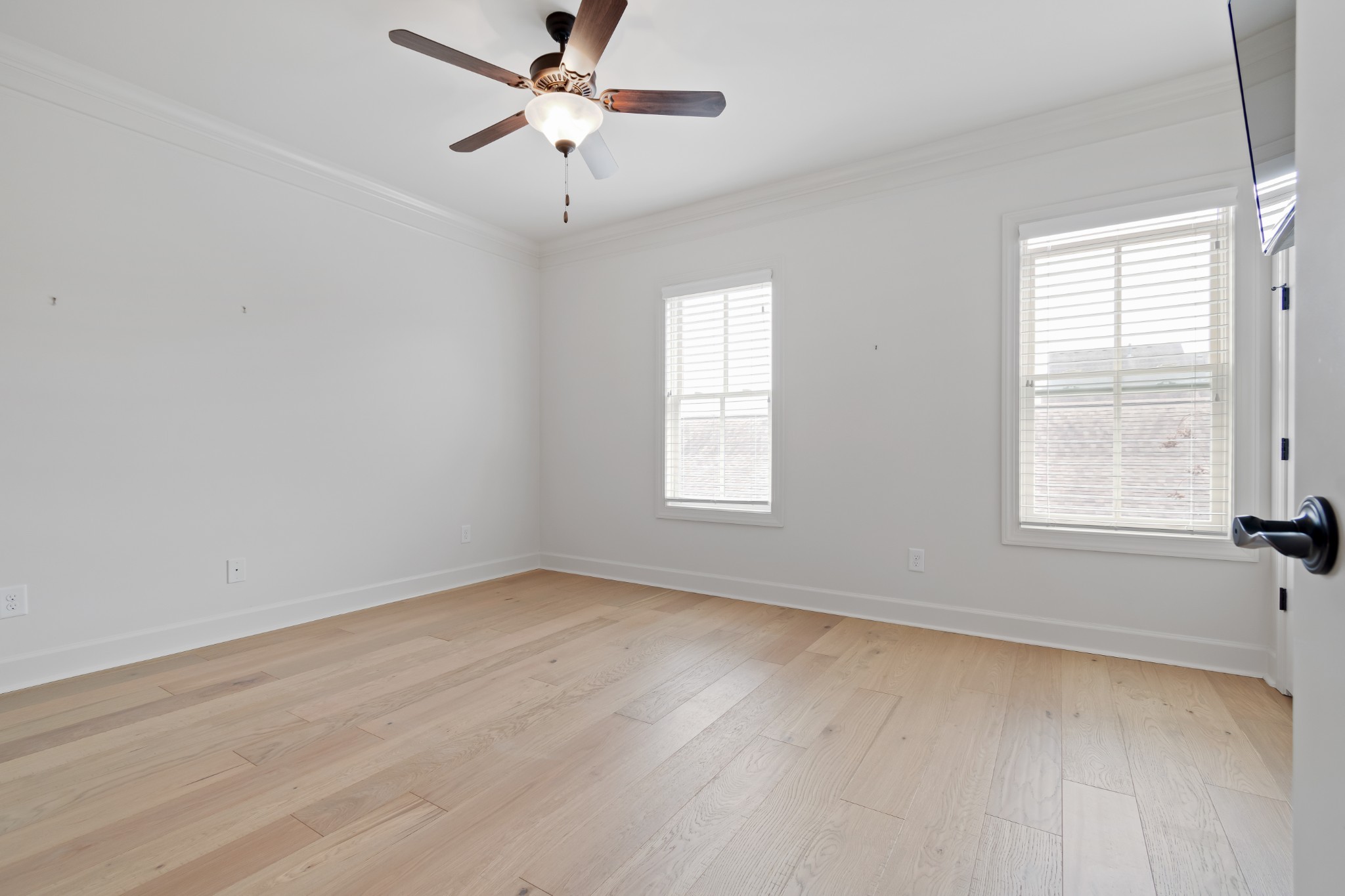 106 Front Street, Unit 23 Franklin, TN 37064 - Photo 15 of 39 wooden floor in an empty room with a window