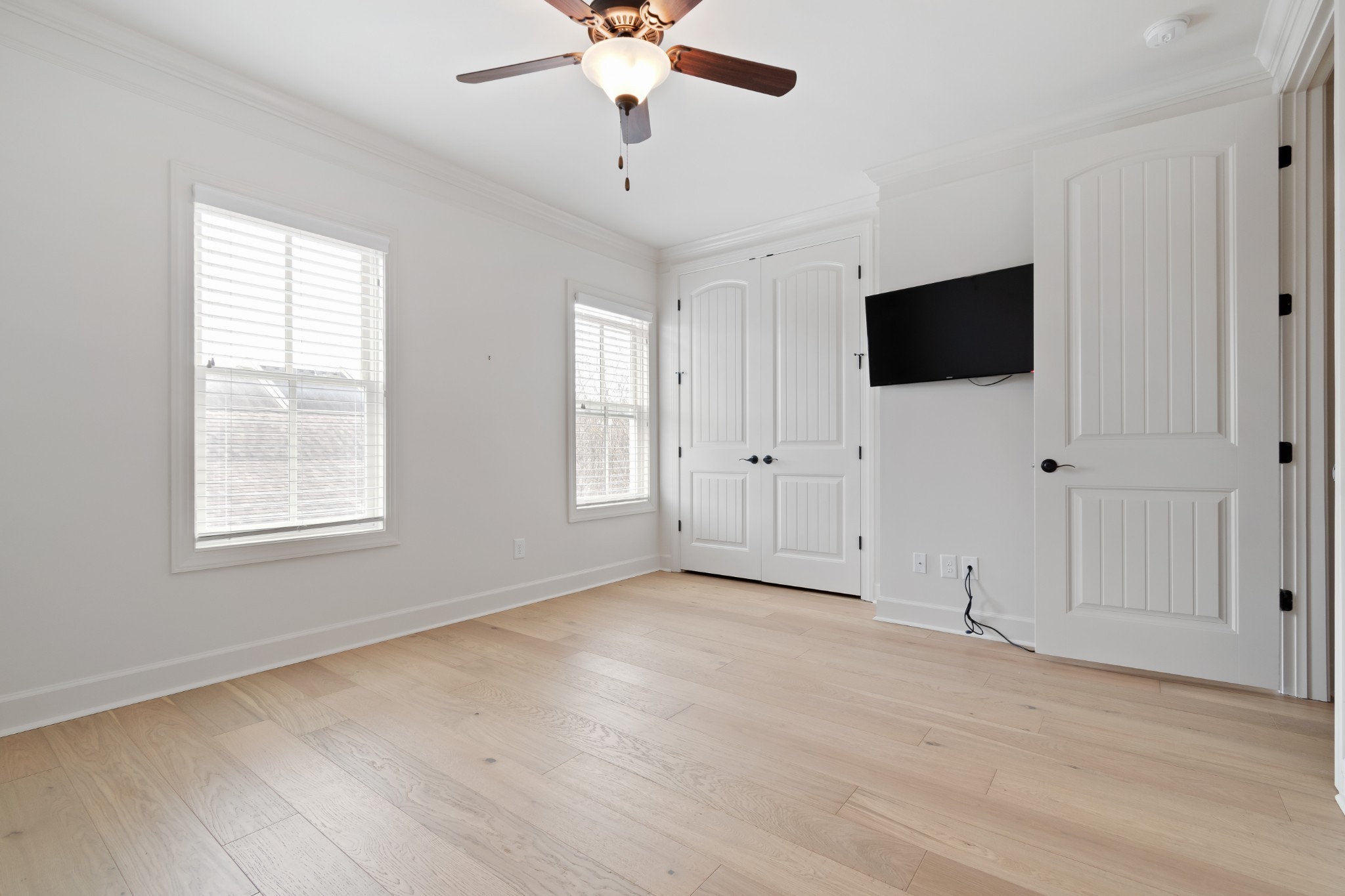 106 Front Street, Unit 23 Franklin, TN 37064 - Photo 16 of 39 a view of an empty room with a window and a kitchen
