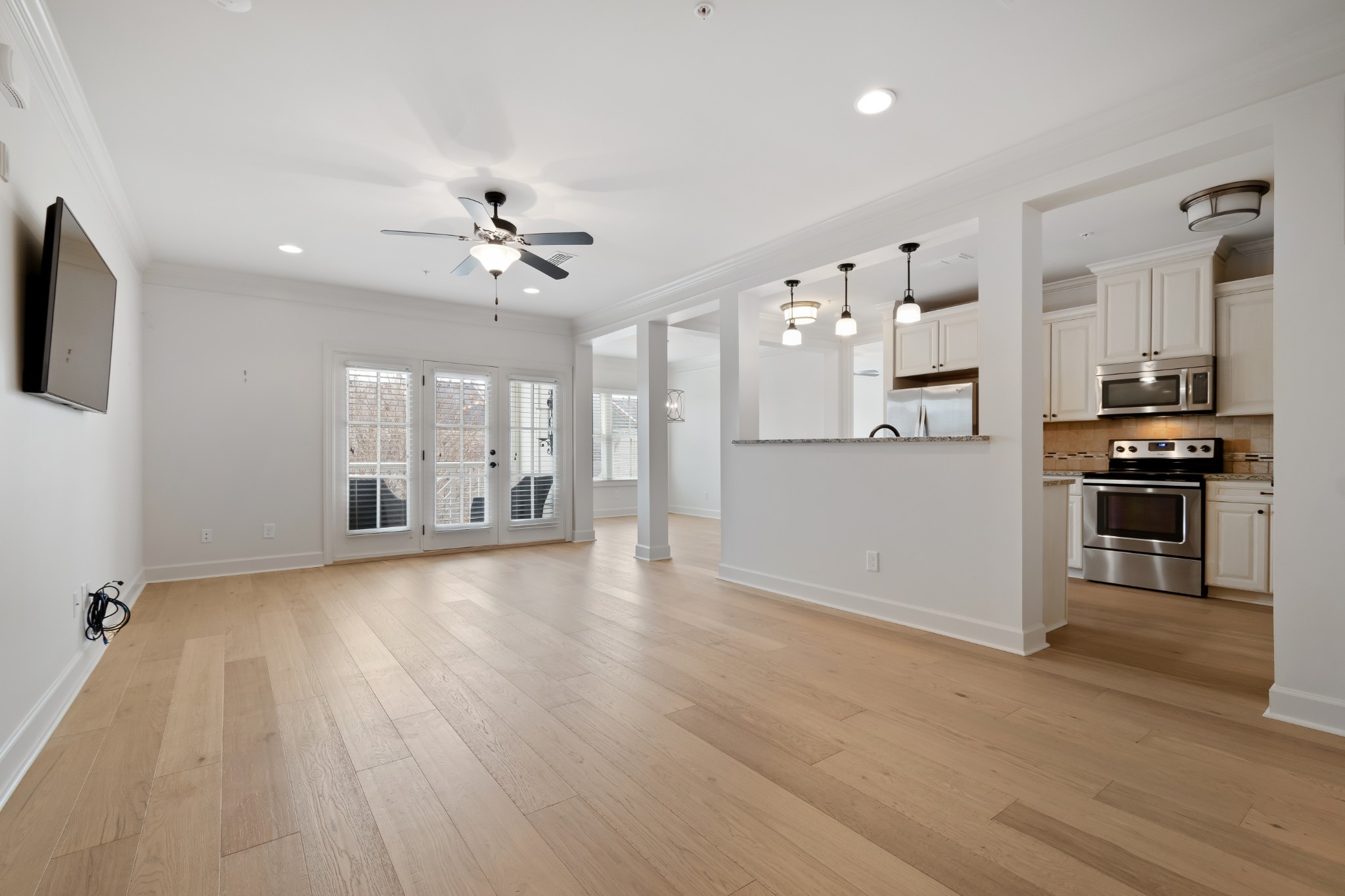 106 Front Street, Unit 23 Franklin, TN 37064 - Photo 19 of 39 a view of a kitchen with wooden floor and a kitchen