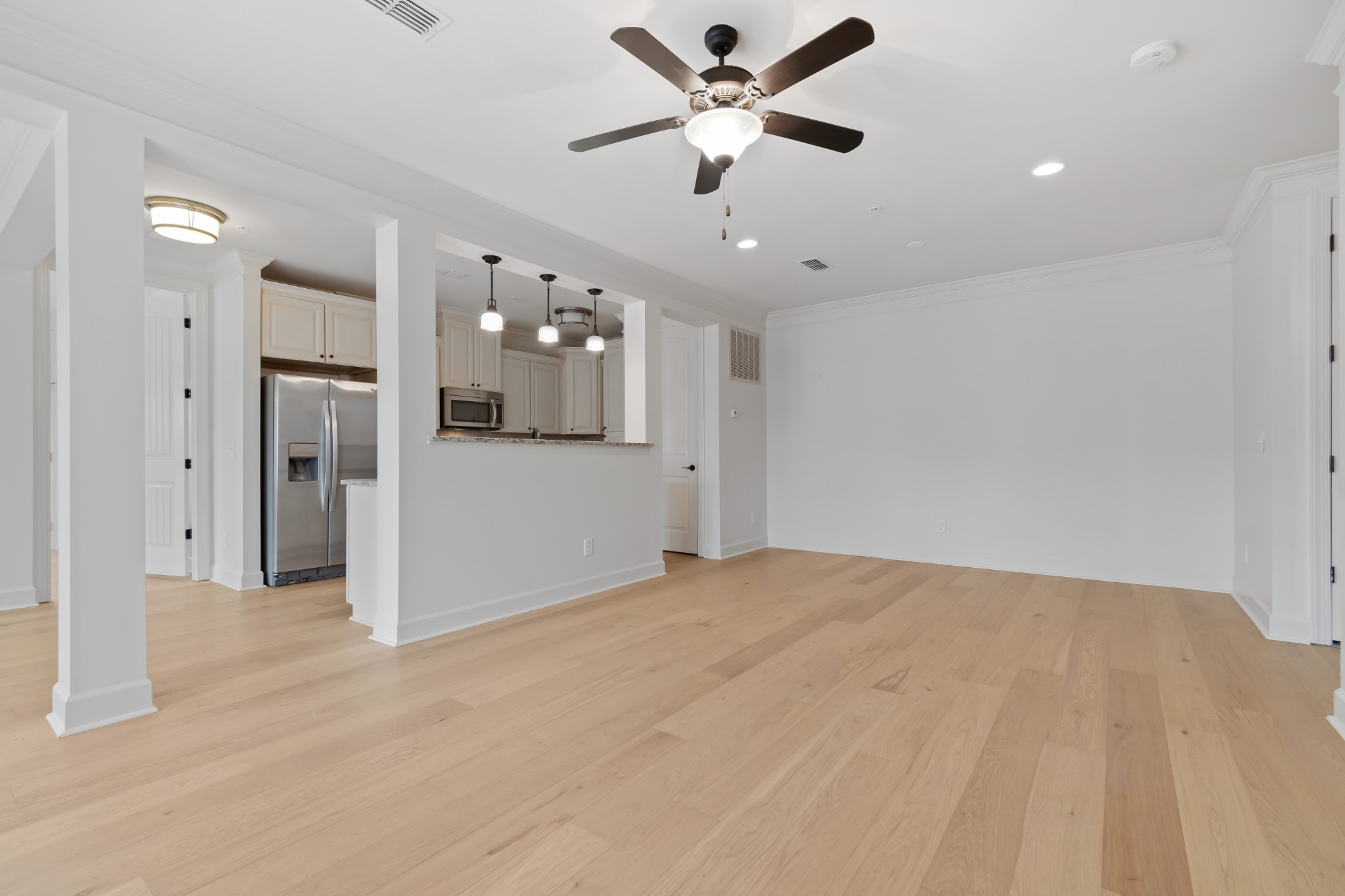 106 Front Street, Unit 23 Franklin, TN 37064 - Photo 20 of 39 a view of an empty room with a ceiling fan