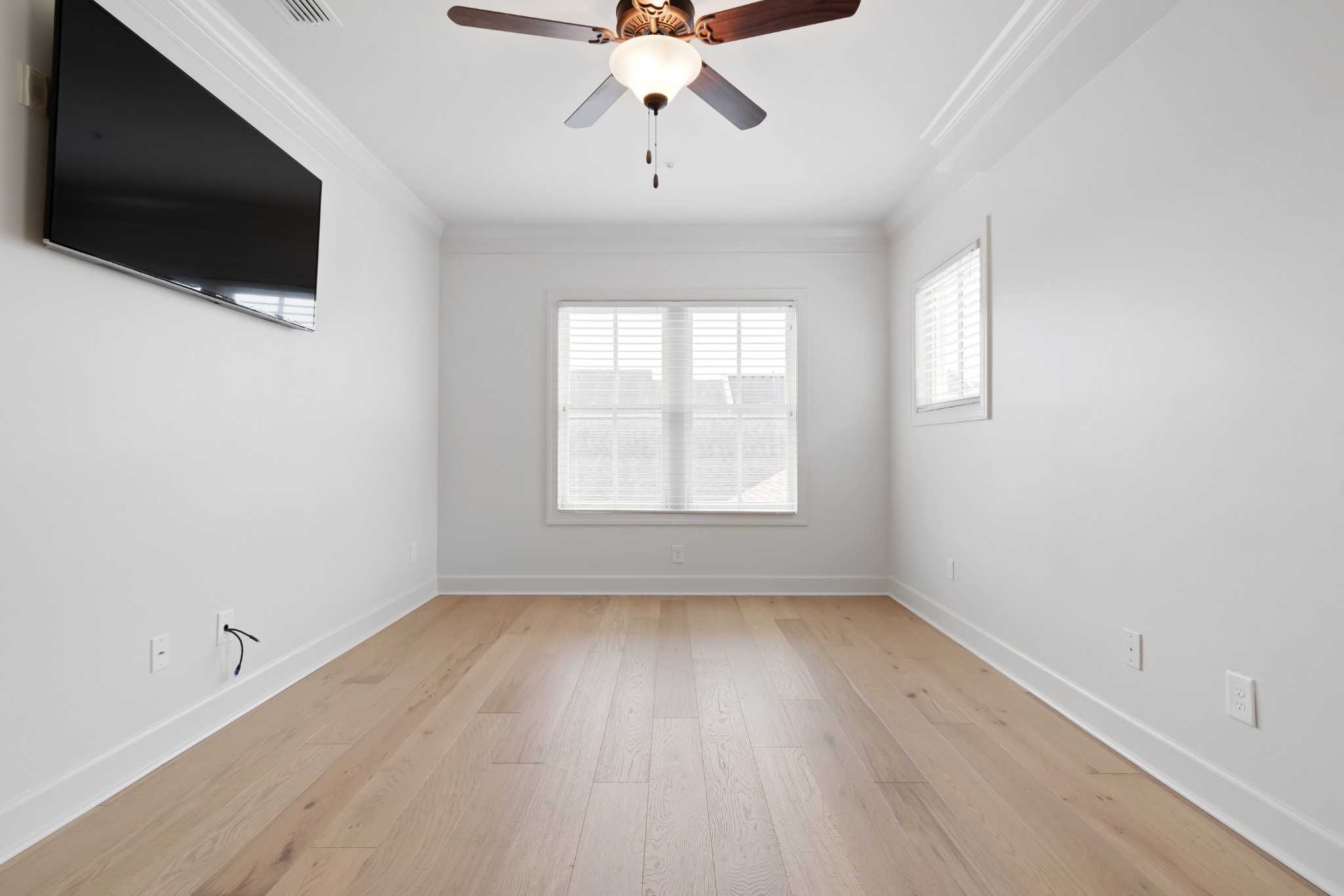 106 Front Street, Unit 23 Franklin, TN 37064 - Photo 29 of 39 wooden floor in an empty room with a window