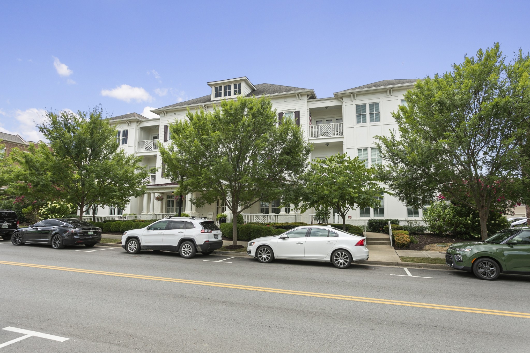 106 Front Street, Unit 23 Franklin, TN 37064 - Photo 3 of 39 a view of a cars parked in front of a building