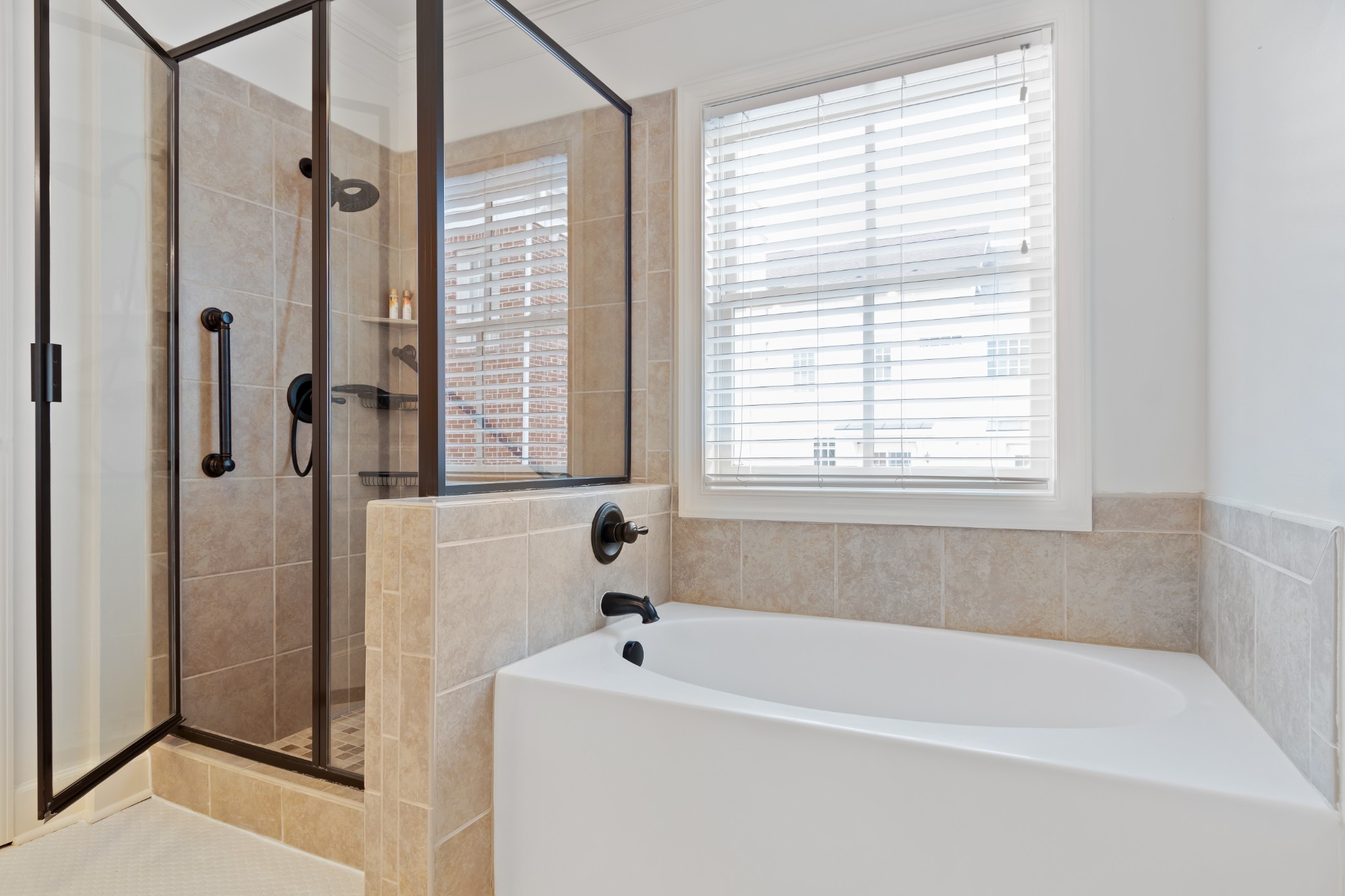 106 Front Street, Unit 23 Franklin, TN 37064 - Photo 32 of 39 a white bath tub sitting next to a window