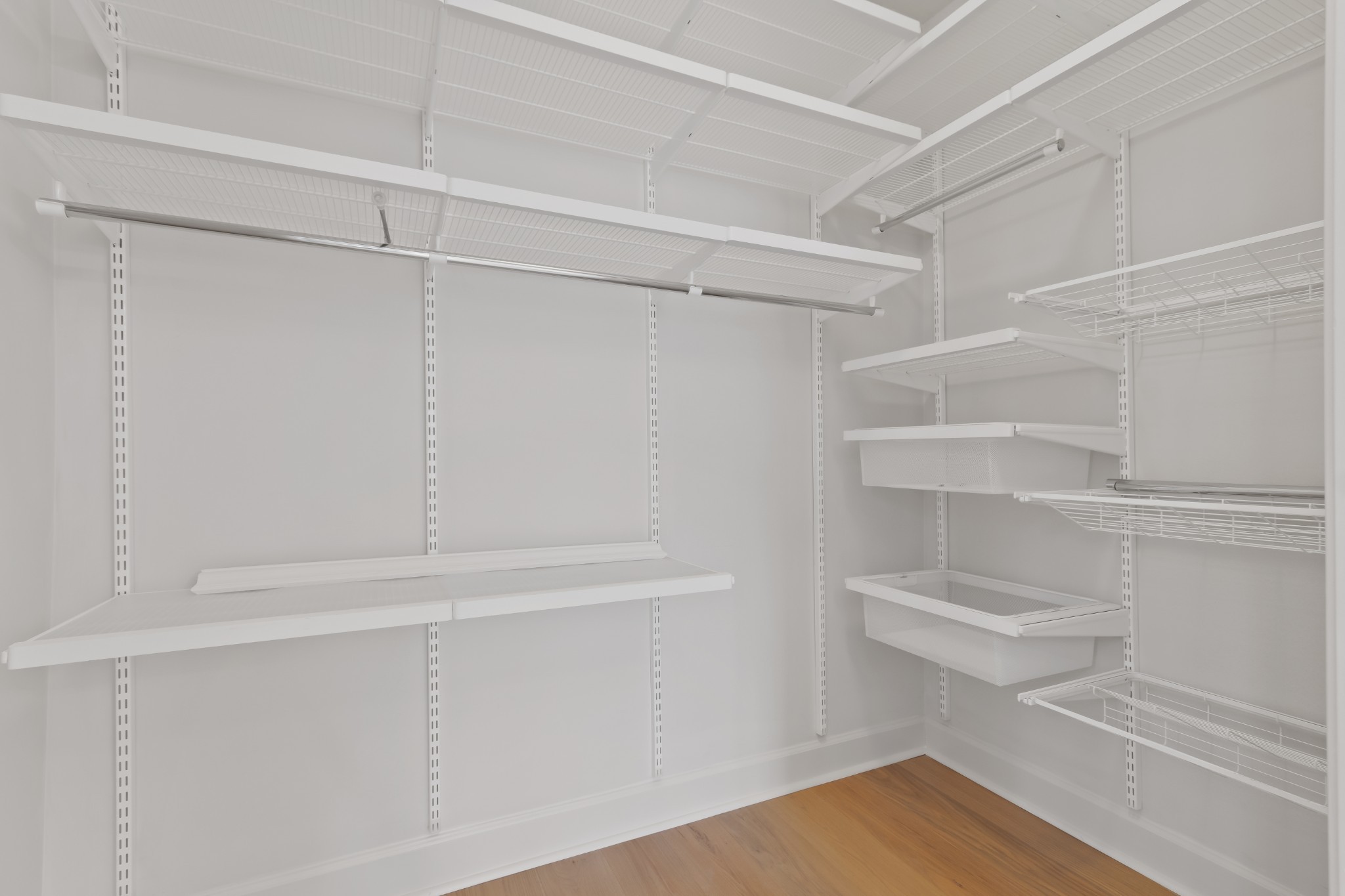 106 Front Street, Unit 23 Franklin, TN 37064 - Photo 33 of 39 a view of walk in closet with empty racks