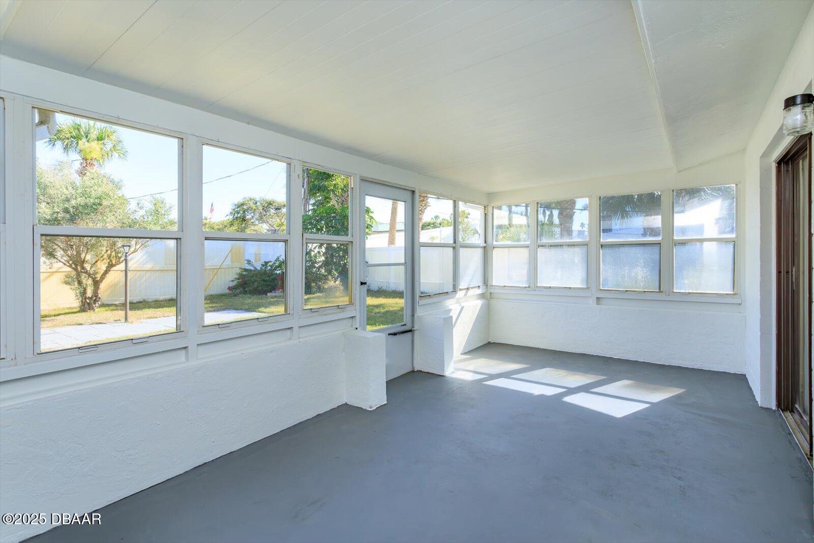 4319 South Peninsula Drive Ponce Inlet, FL 32127 - Photo 19 of 30 a view of an empty room with a window