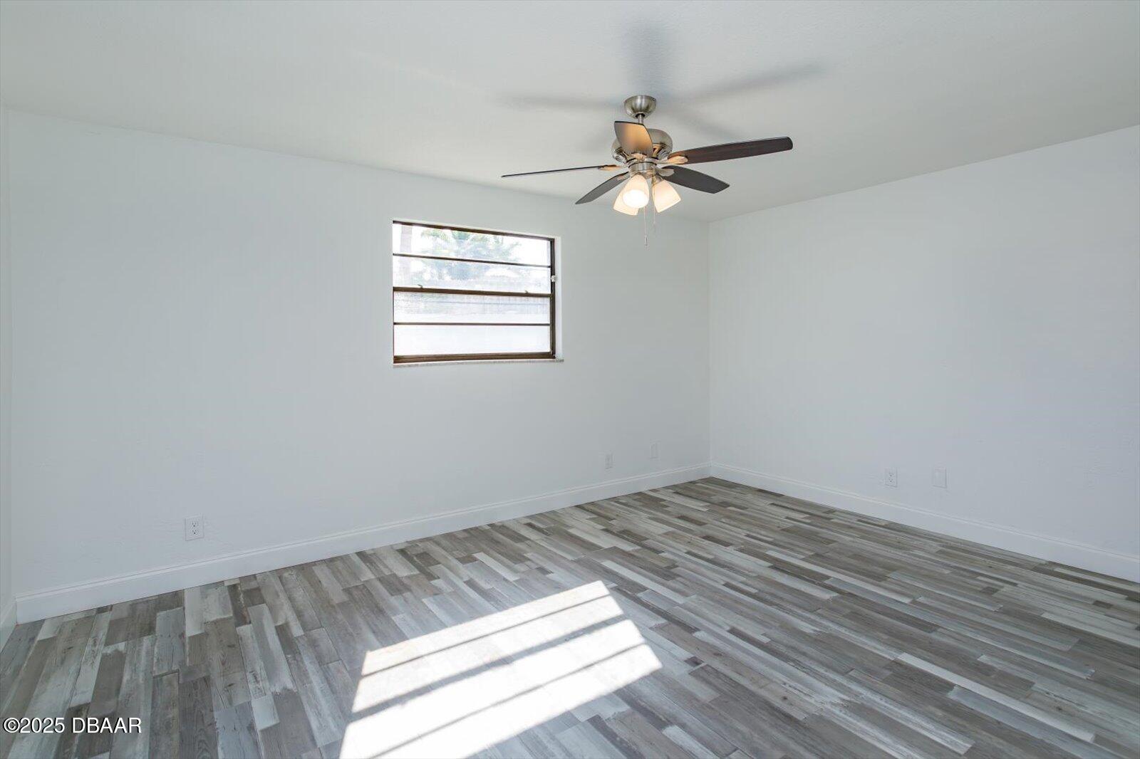 4319 South Peninsula Drive Ponce Inlet, FL 32127 - Photo 22 of 30 wooden floor in an empty room