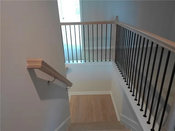 a view of balcony with wooden floor