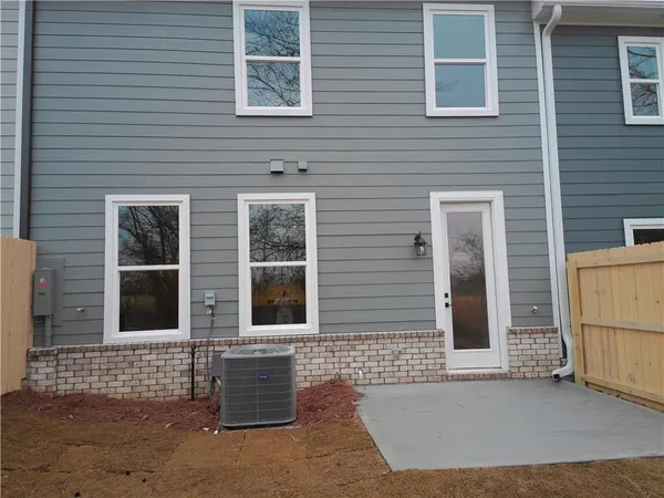 a front view of a house with a garage