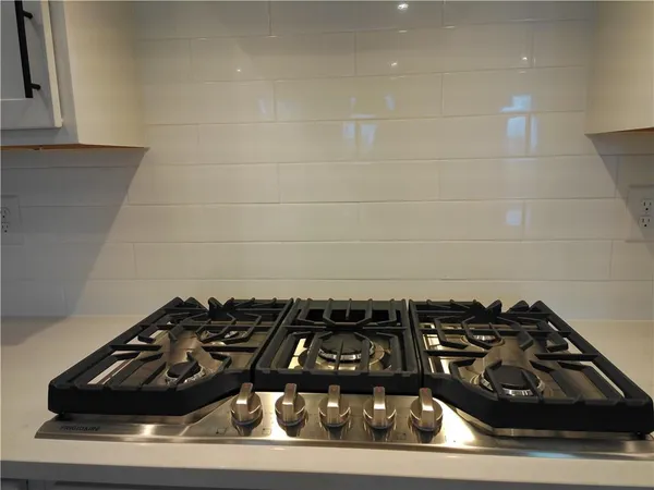 a close up of a stove top oven sitting on a counter