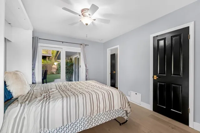 a large bathroom with a large tub and sink