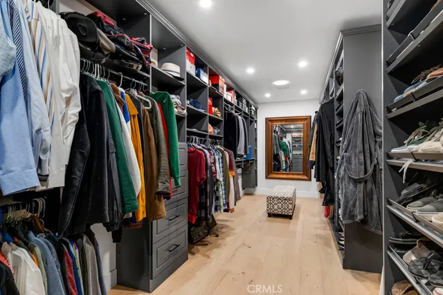 a kitchen with a sink counter top space and stainless steel appliances