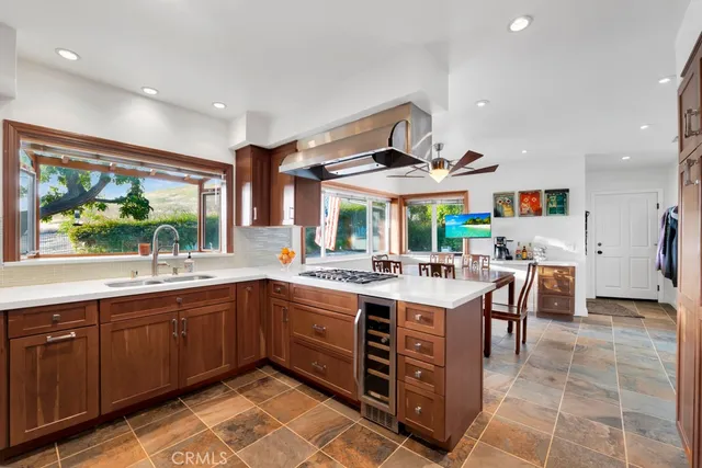 a swimming pool with outdoor seating and yard