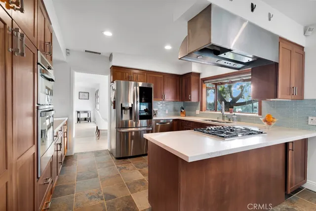 a view of a chairs and table in the patio