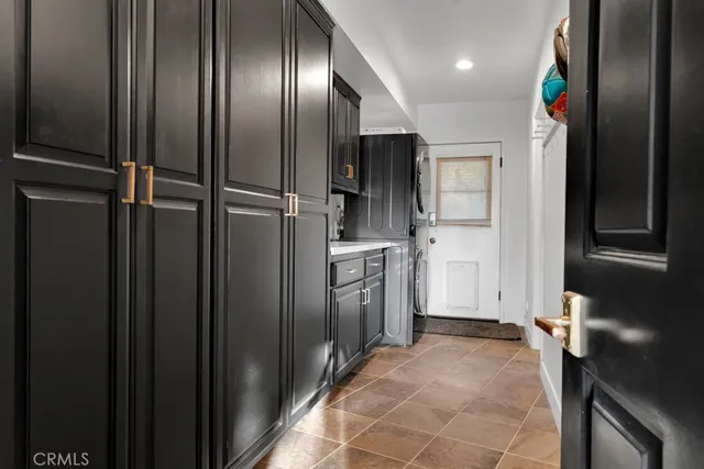 a front view of a house with swimming pool having outdoor seating