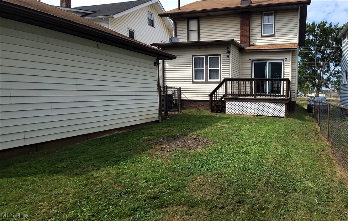 3210 Dryden Court Southwest Canton, OH 44708 - Photo 23 of 24 Back of property with a deck and a yard