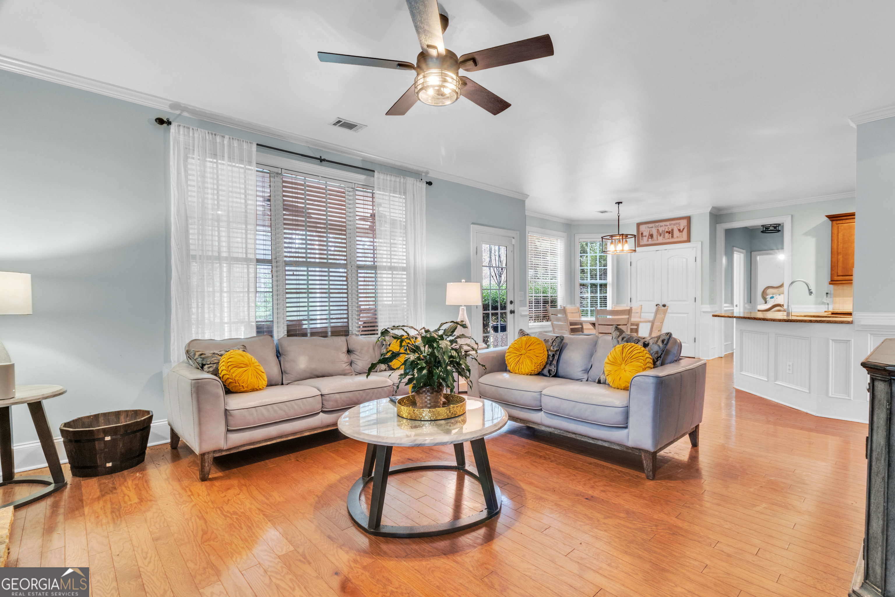 111 Caraway Road Locust Grove, GA 30248 - Photo 20 of 52 a living room with furniture and a flat screen tv