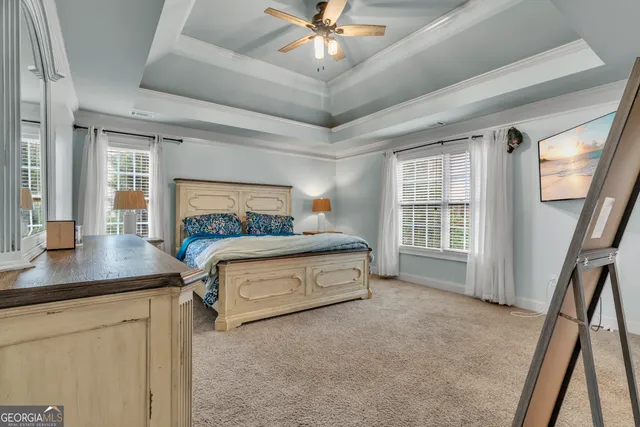 a spacious bathroom with a double vanity sink and a mirror
