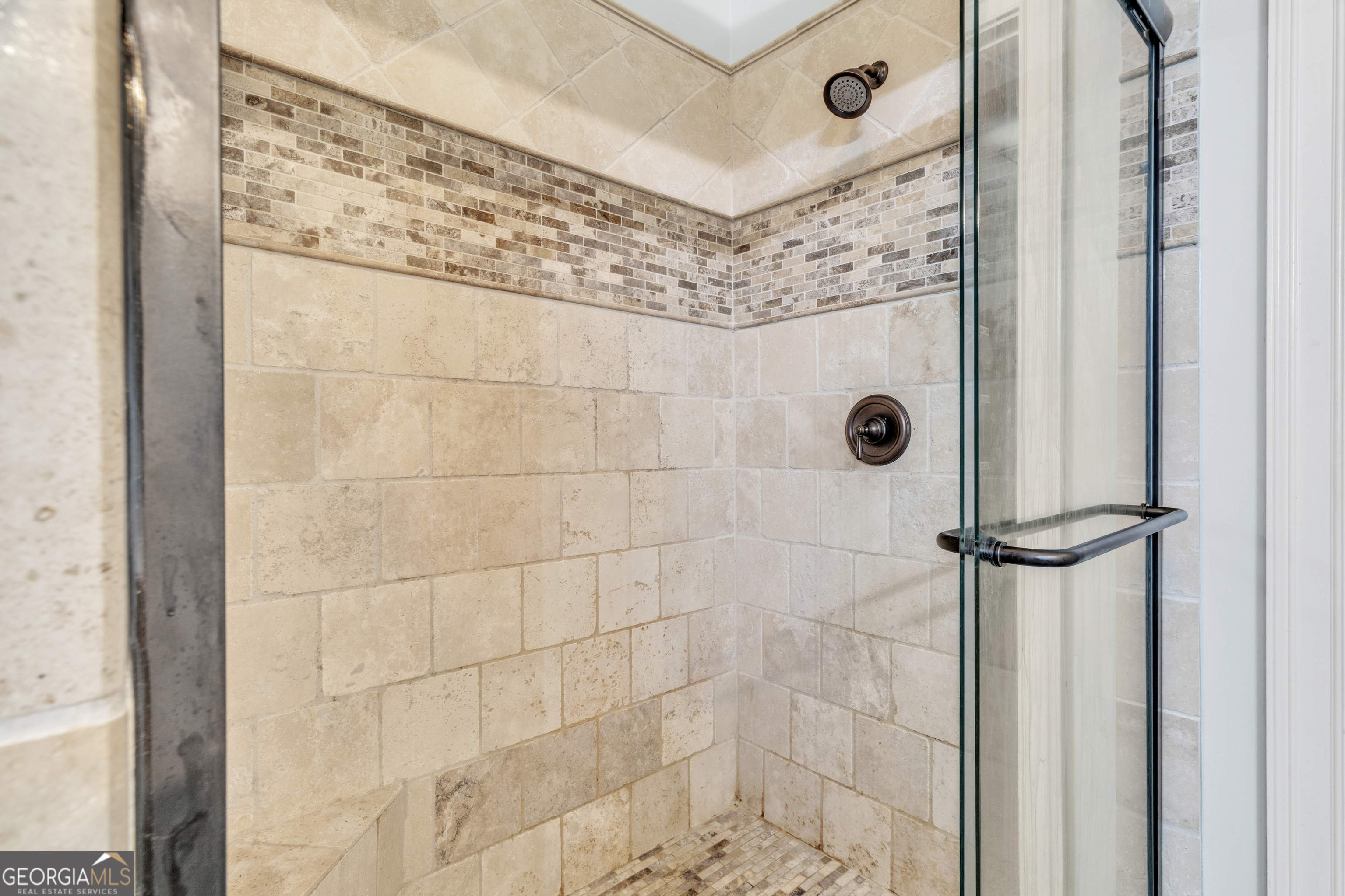 111 Caraway Road Locust Grove, GA 30248 - Photo 39 of 52 a bathroom with a shower