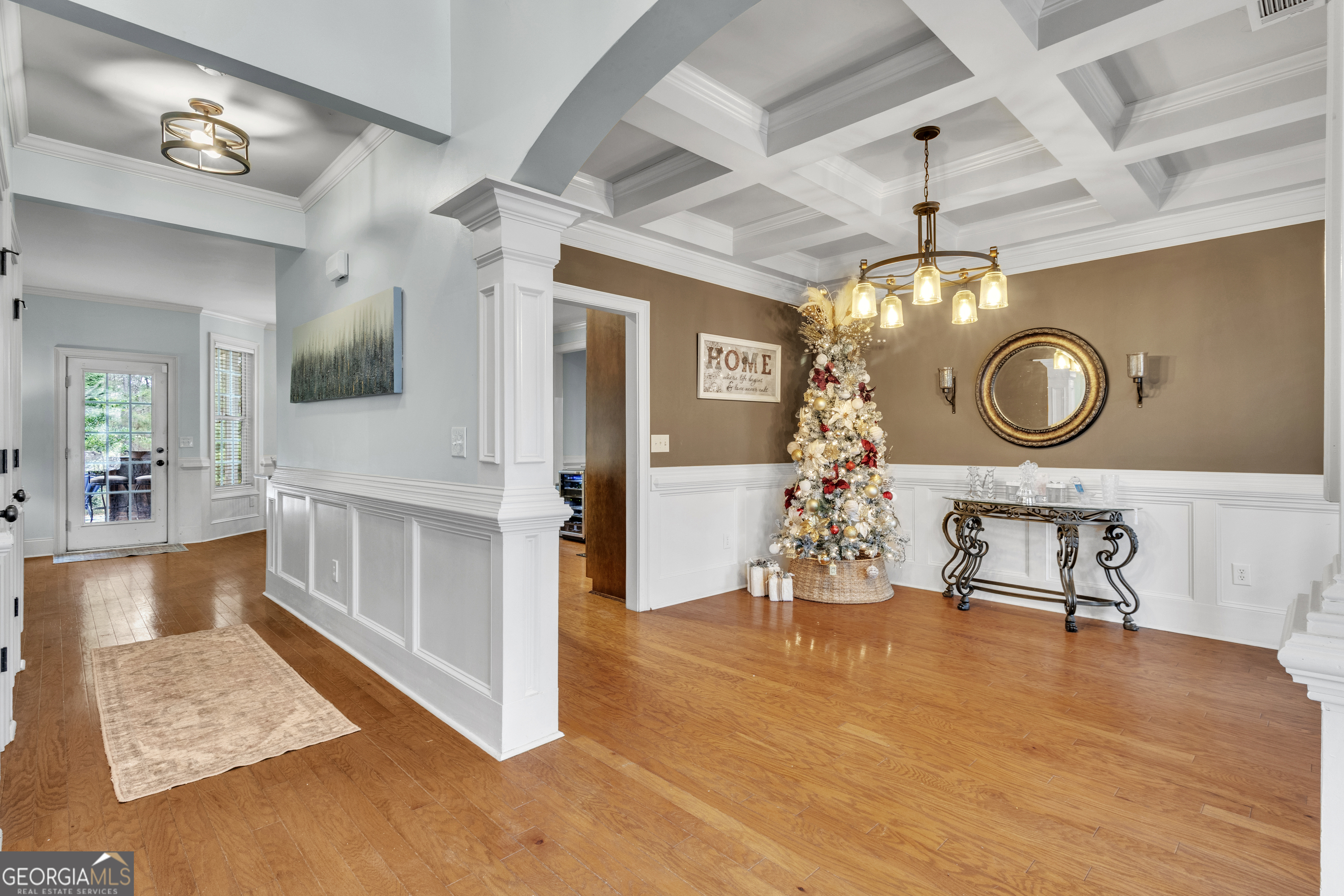 111 Caraway Road Locust Grove, GA 30248 - Photo 46 of 52 a view of a livingroom with kitchen and furniture