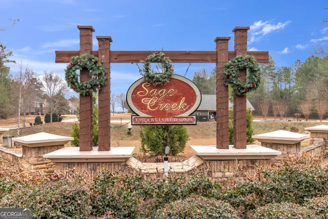 a view of a swimming pool with a yard