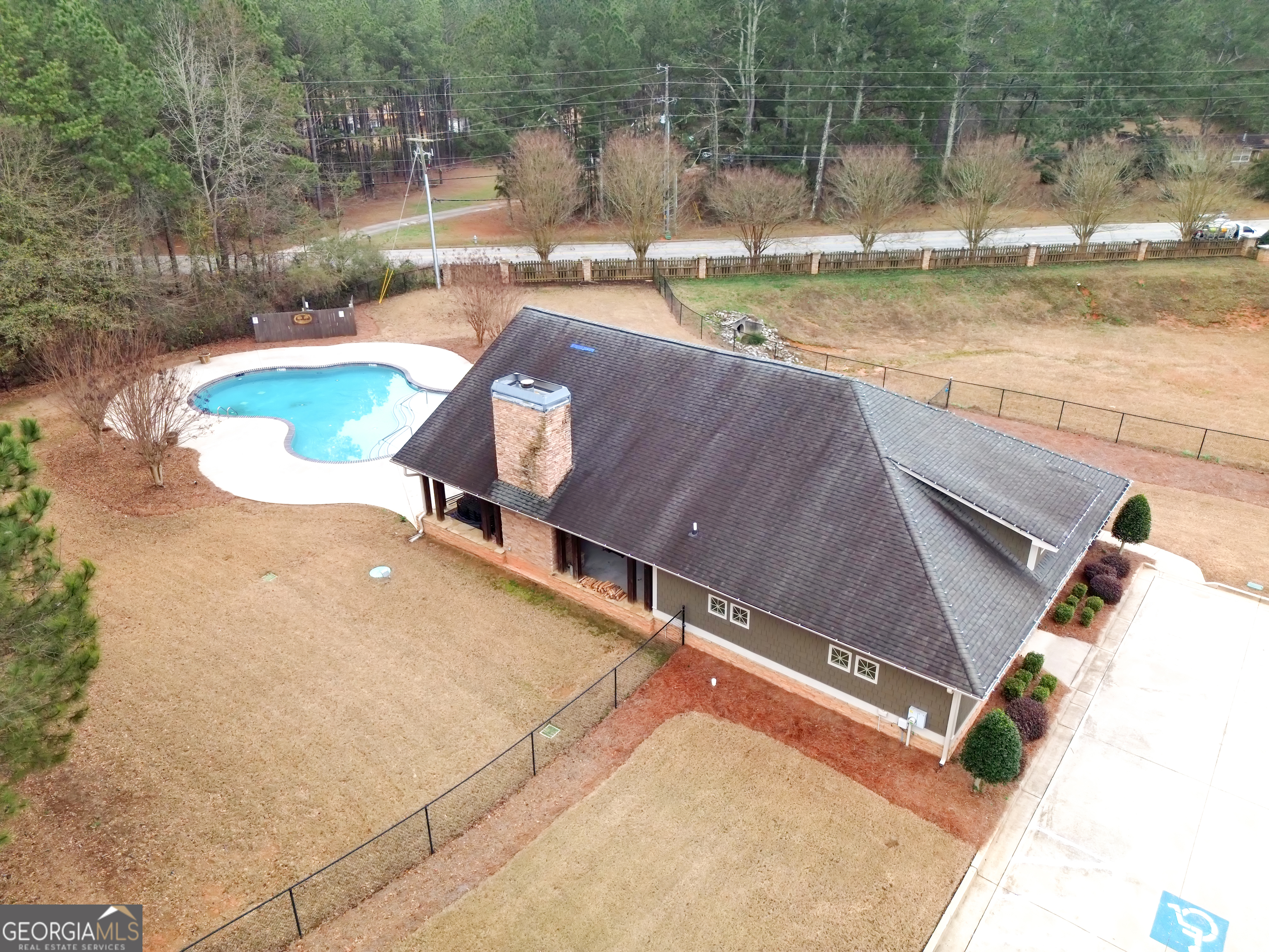 111 Caraway Road Locust Grove, GA 30248 - Photo 51 of 52 a view of a swimming pool with a yard