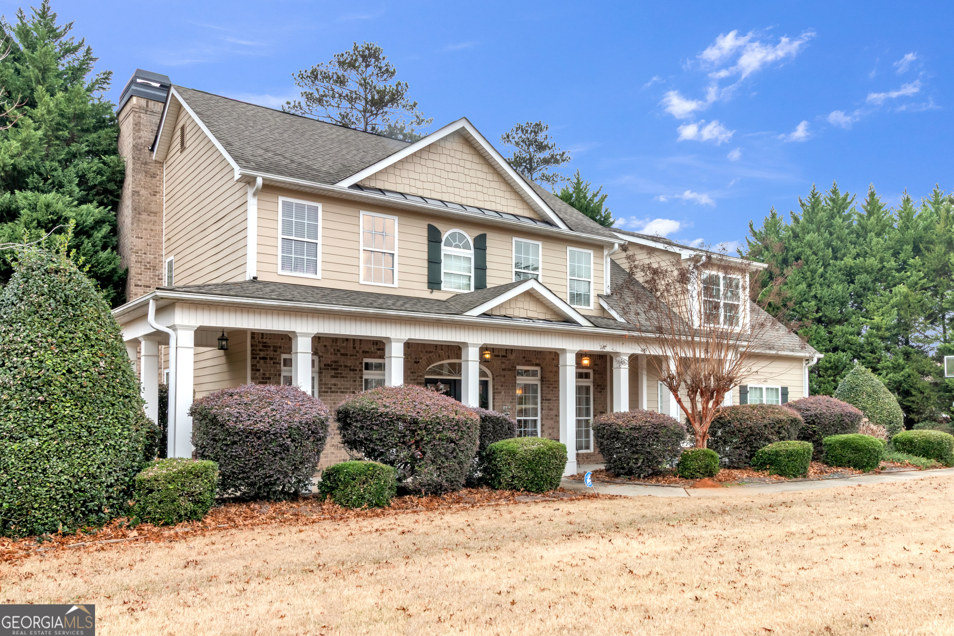 111 Caraway Road Locust Grove, GA 30248 - Photo 7 of 52 a front view of a house with a yard