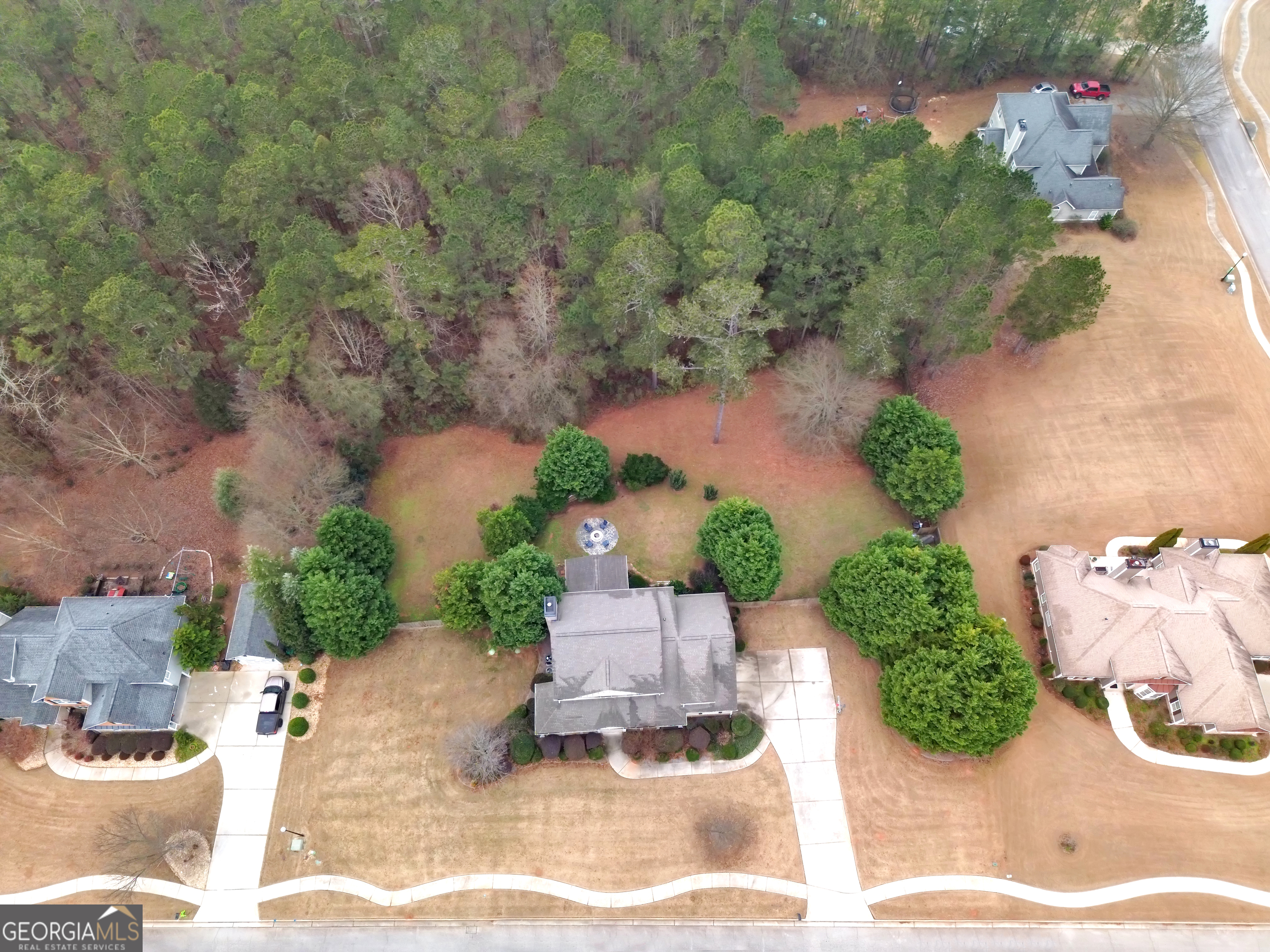 111 Caraway Road Locust Grove, GA 30248 - Photo 10 of 52 an aerial view of a house with yard