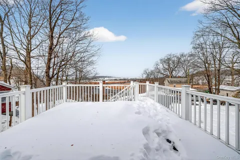 a balcony with a yard