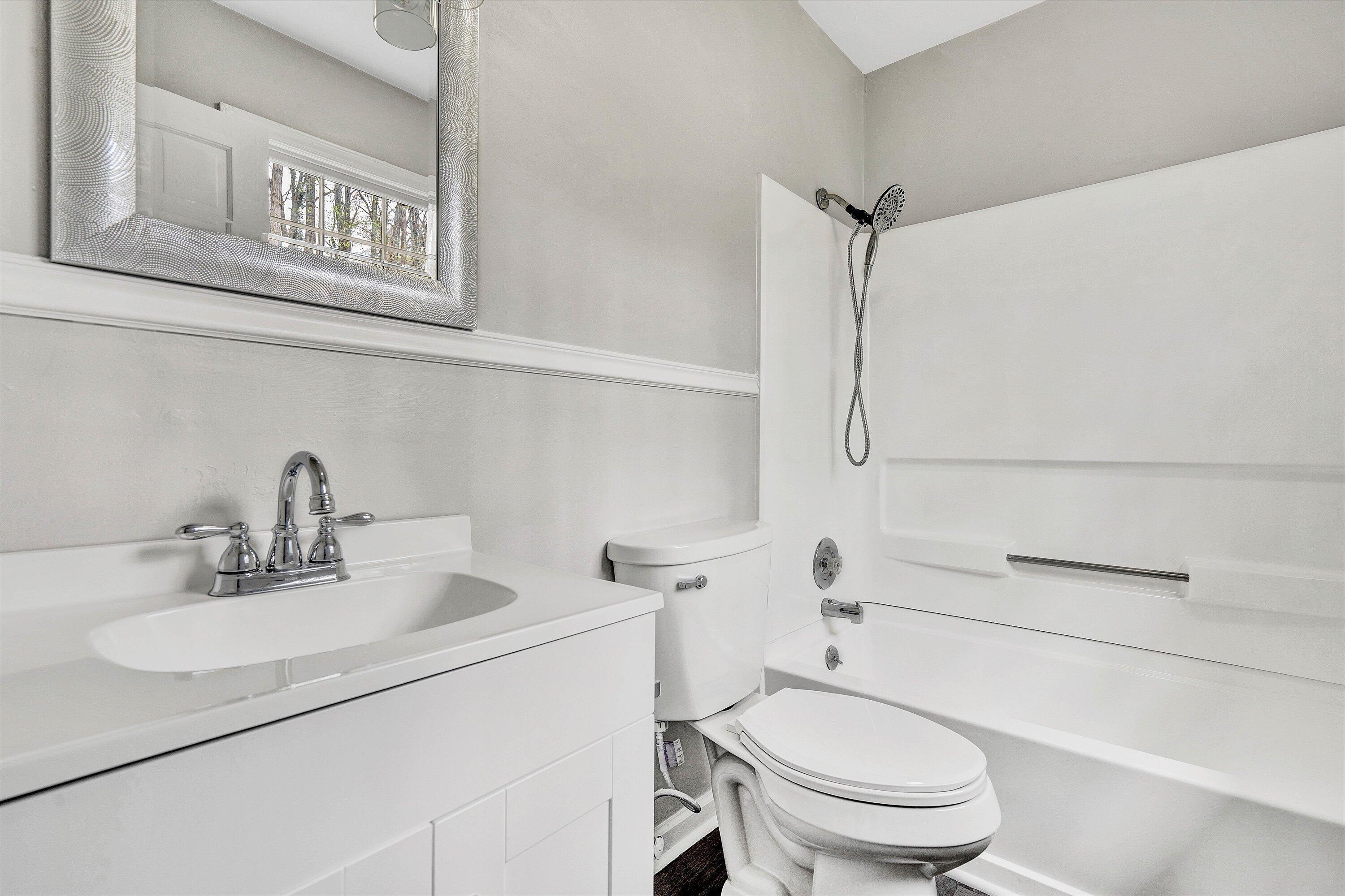 355 Pin Oak Drive Blue Ridge, VA 24064 - Photo 15 of 33 a bathroom with a sink toilet and shower