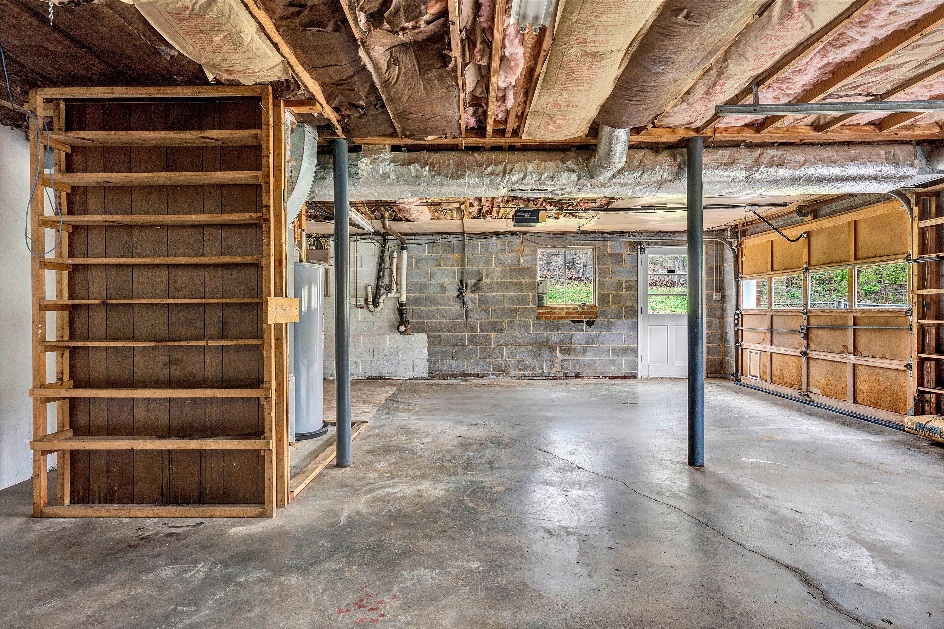 355 Pin Oak Drive Blue Ridge, VA 24064 - Photo 25 of 33 a view of an empty room with wooden floor and windows