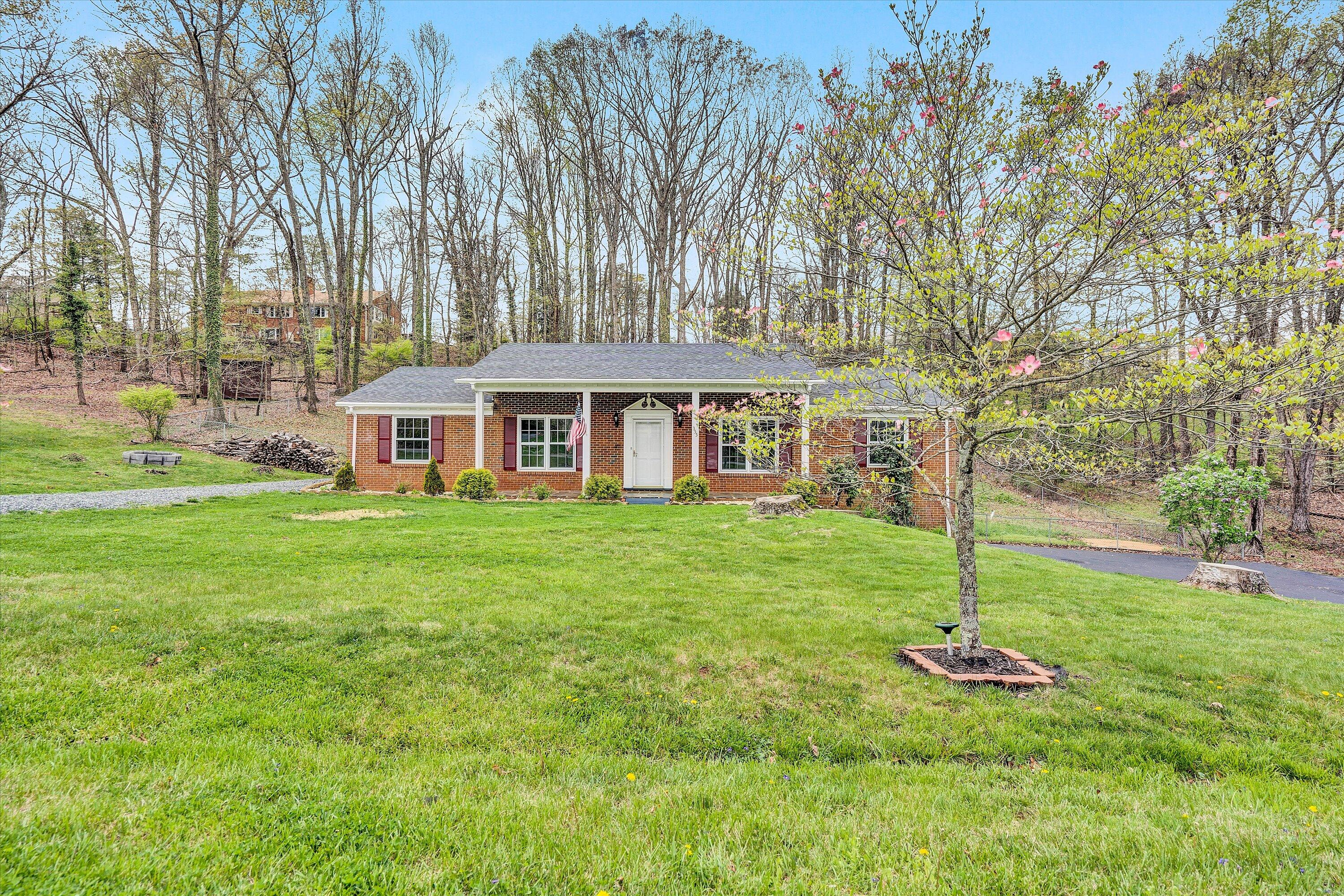 355 Pin Oak Drive Blue Ridge, VA 24064 - Photo 30 of 33 a front view of a house with a yard