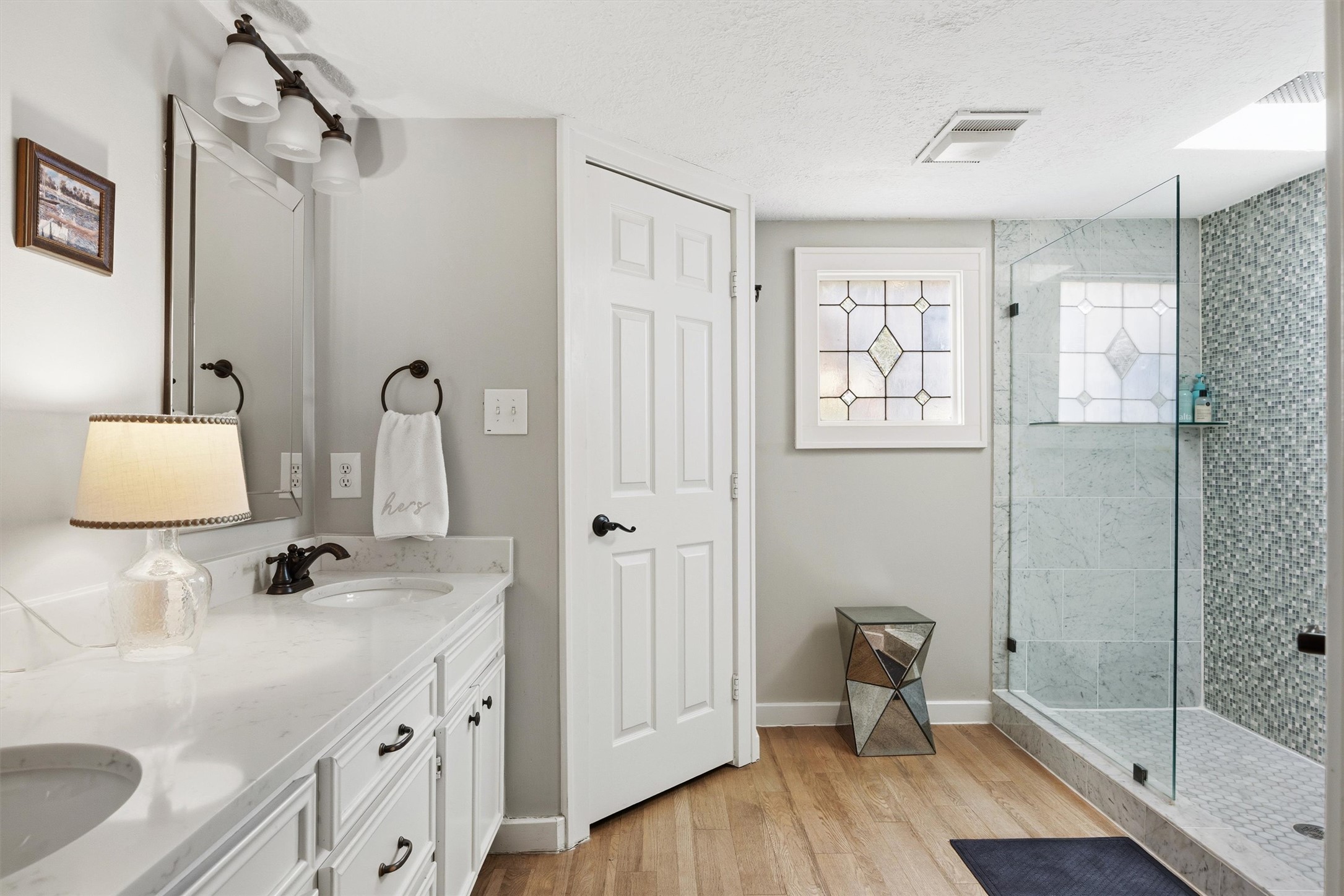 1507 Wethersfield Road Austin, TX 78703 - Photo 24 of 40 a bathroom with a sink a toilet and shower