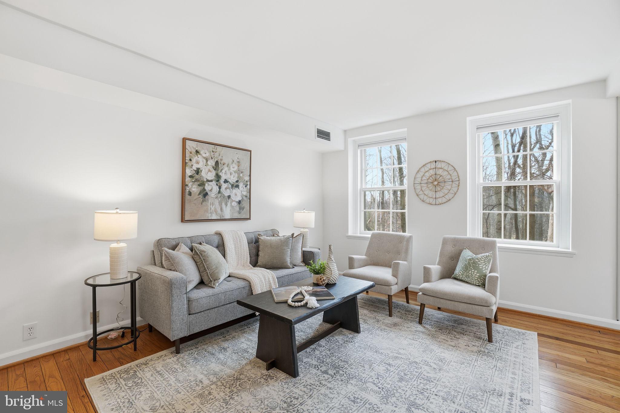 3430 39th Street Northwest, Unit 700 Washington, DC 20016 - Photo 2 of 22 Living Room with windows on 3 sides
