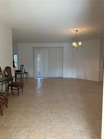 a kitchen with stainless steel appliances a stove a microwave and a refrigerator