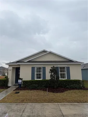front view of house with a yard