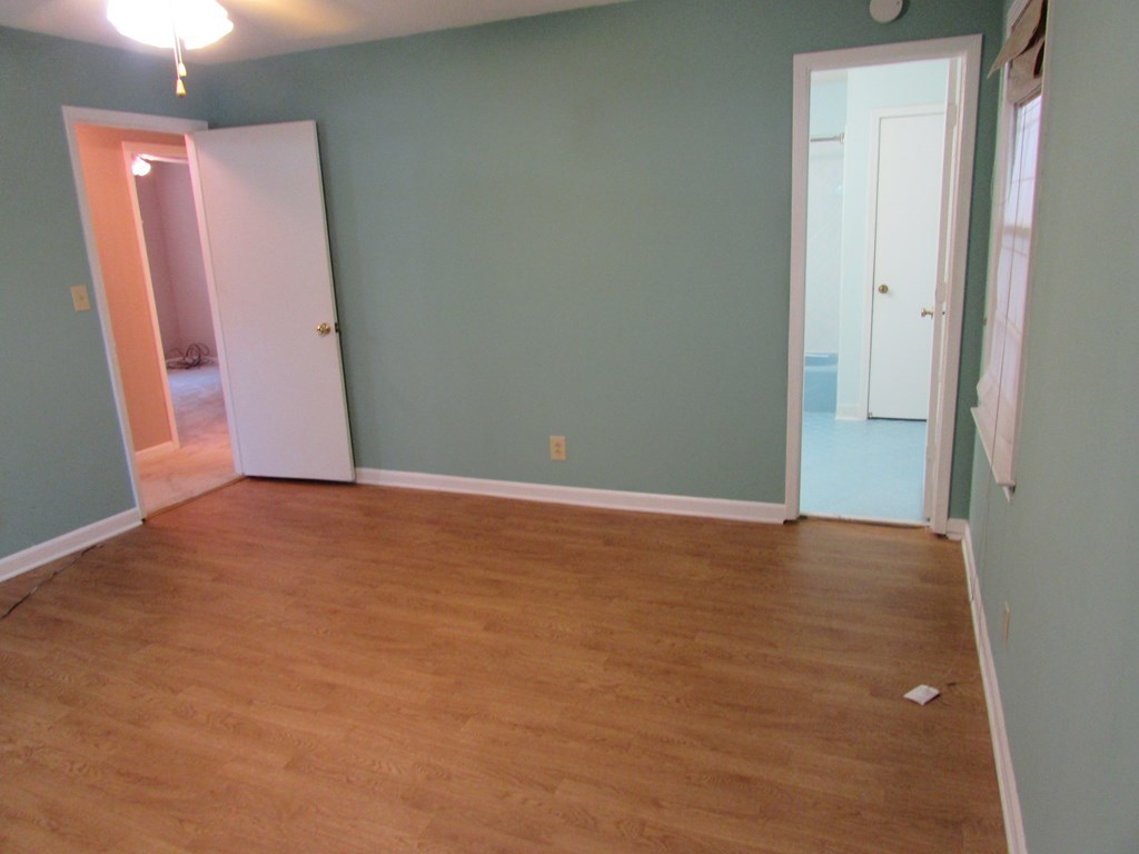 3847 Hartley Bridge Road Macon, GA 31216 - Photo 11 of 26 an empty room with closet