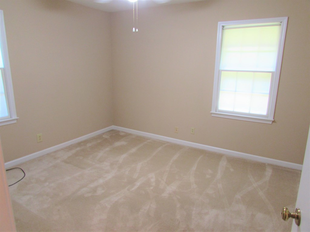 3847 Hartley Bridge Road Macon, GA 31216 - Photo 14 of 26 an empty room with a window