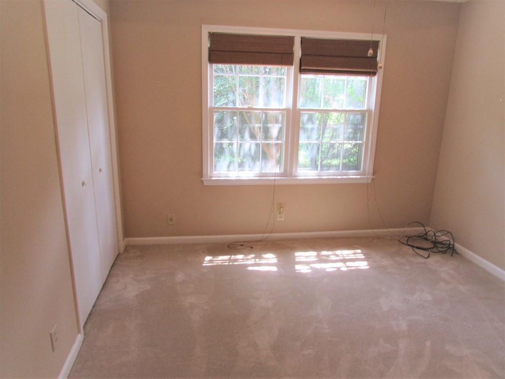 3847 Hartley Bridge Road Macon, GA 31216 - Photo 15 of 26 a view of an empty room with a window
