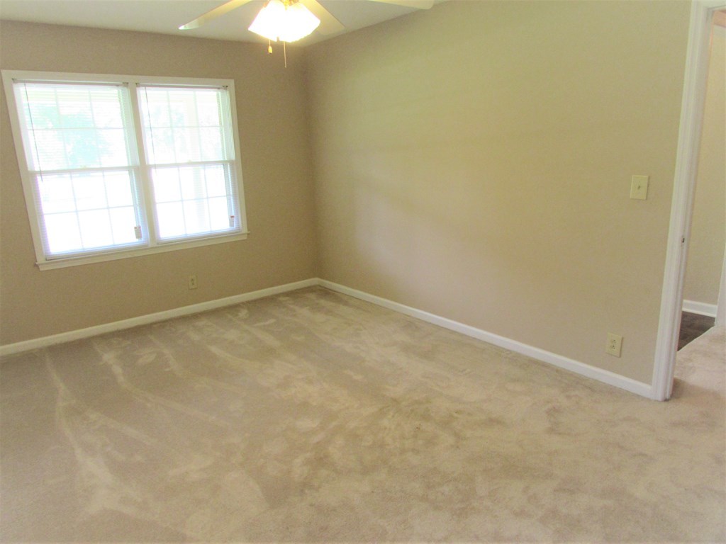3847 Hartley Bridge Road Macon, GA 31216 - Photo 18 of 26 an empty room with a window