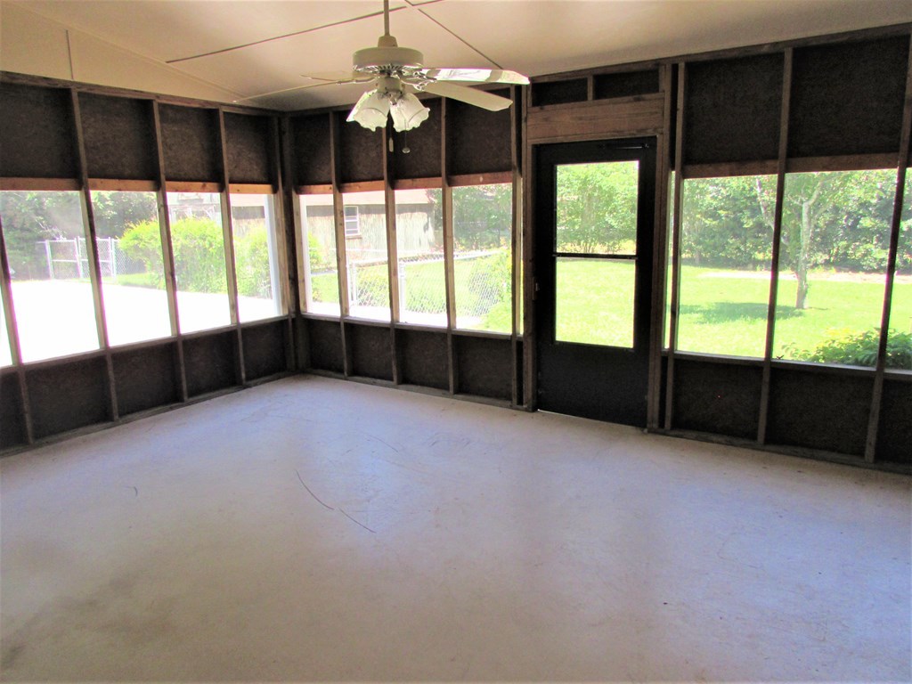 3847 Hartley Bridge Road Macon, GA 31216 - Photo 25 of 26 a view of an empty room with a window